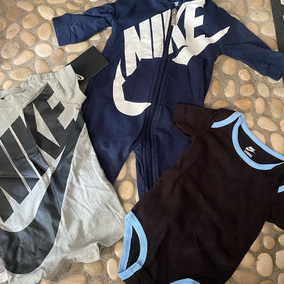 NIKE TRIO!! 1 NWT romper, 1 NWOT onesie, 1 EUC sweatsuit🖤🤎💙 unisex - Picture 1 of 9
